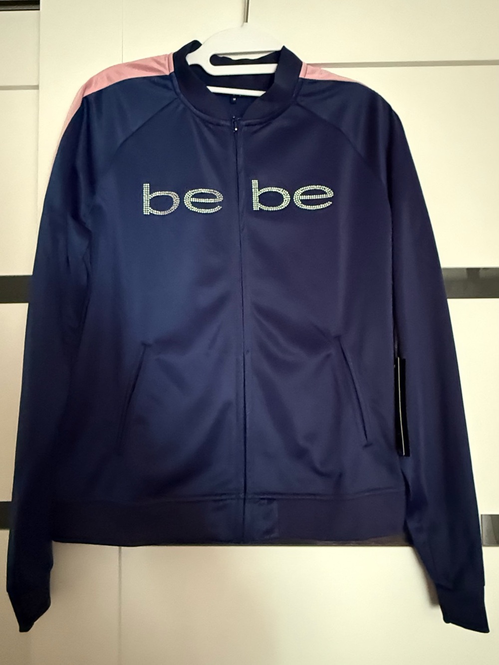bebe Navy Track Jacket with Pink and white Shoulder and sleeve Accents